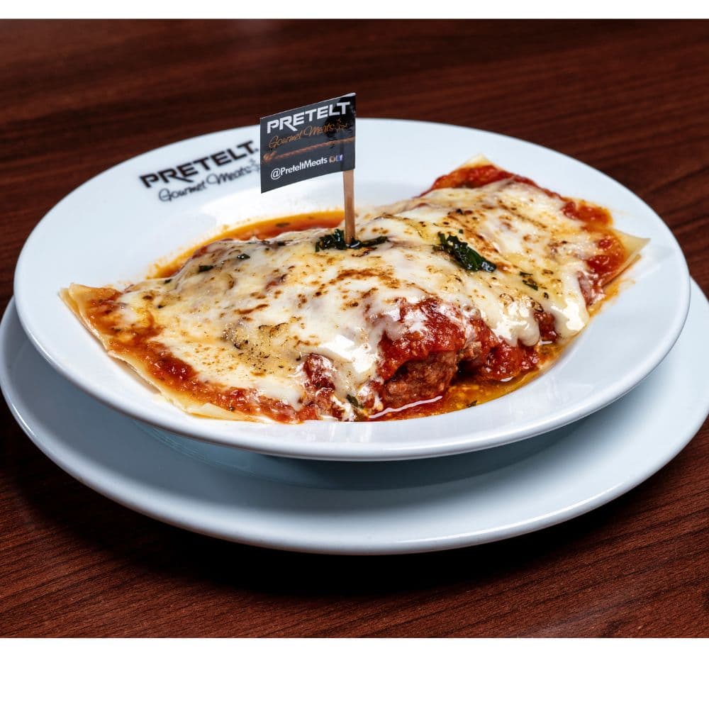 ravioli abierto de carne y hongos